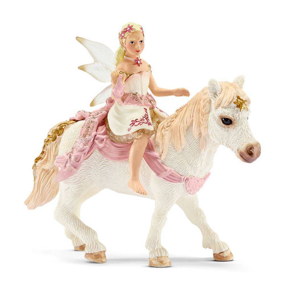 Schleich Мир Эльфов Эльф Нежная Лилия верхом на пони (70501) для девочек  где купить в Старом Осколе - SKU2420382